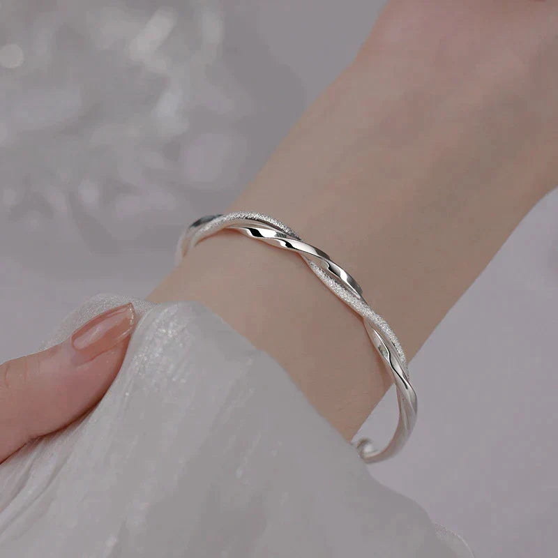 Twisted Sterling Silver Bracelet - Elegant & Timeless Jewelry