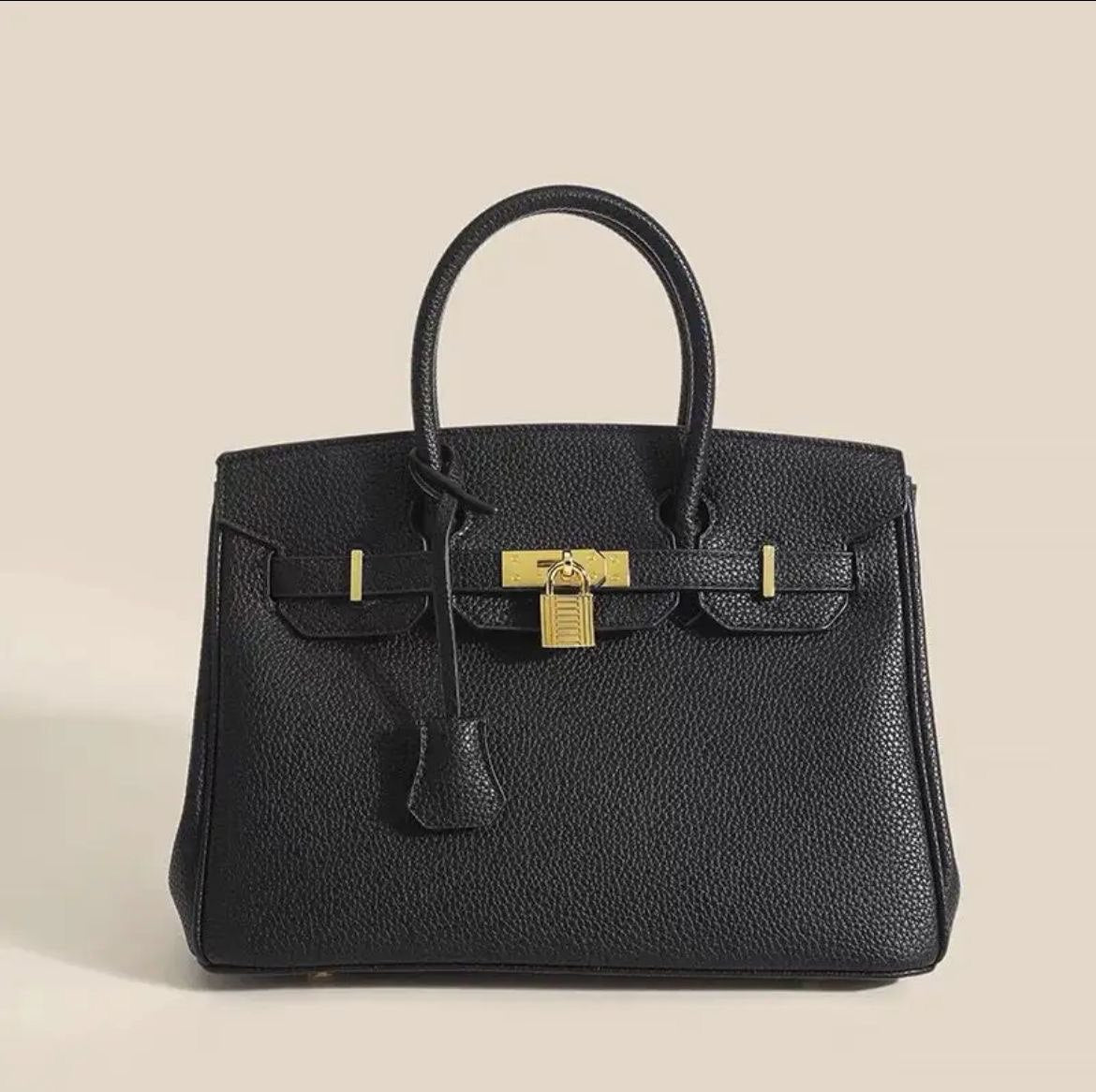 Luxurious Leather Handbag - Timeless Elegance And Functionality